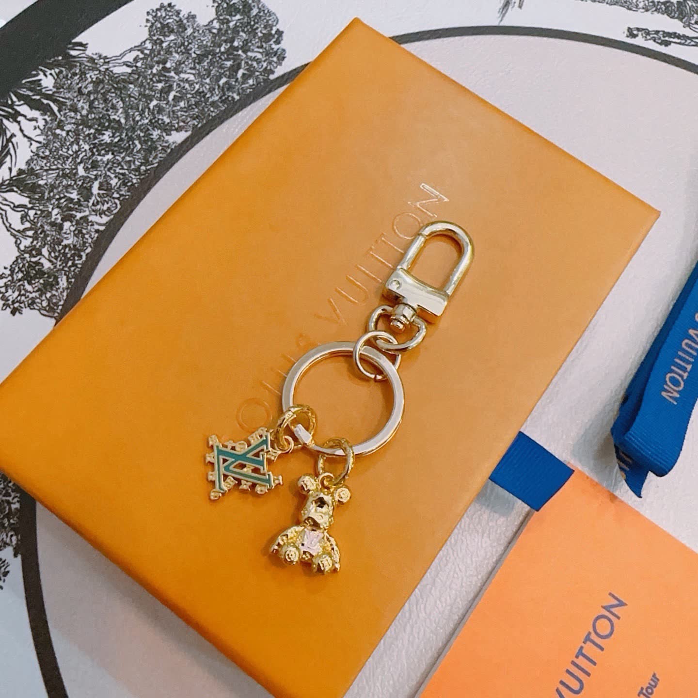 Louis Vuitton Keychain with Monogram and Bear Charm